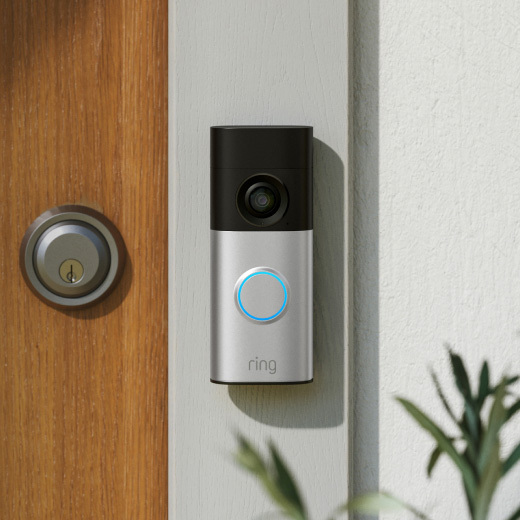 Ring video doorbell installed beside a front door